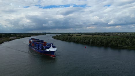 Aerial-View-Of-BG-Onyx-Cargo-Container-Ship-Approaching-Along-Oude-Maas-Through-Zwijndrecht