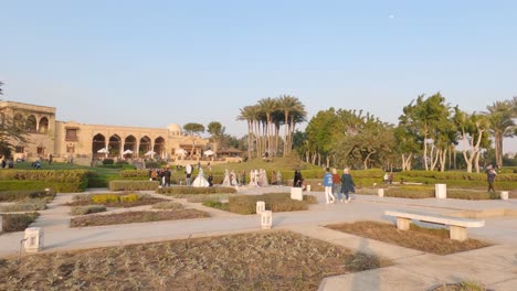 Locals-Walking-Through-Al-Azhar-Park-In-Cairo,-Egypt