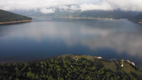 Aerial-view-of-beautiful-Mavrovo-Lake-in-Macedonia-on-a-calm-sunny-day