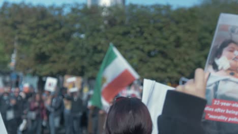 Jina-Mahsa-Amini-killed-under-the-Iranian-Regime-protesters-holding-photos-Dublin-Ireland