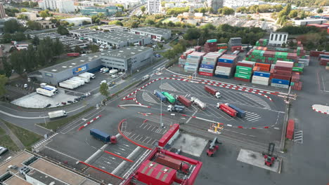 Trucks-in-modern-logistic-center-of-Paris-Terminal-SA,-Gennevilliers-in-France