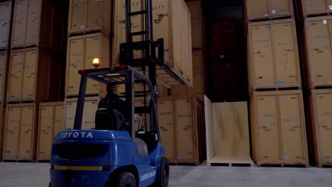 A-fork-lift-doing-all-the-heavy-lifting-and-placing-the-box-in-the-right-place