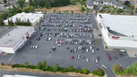 Establishing-drone-shot-of-a-packed-WinCo-Foods-parking-lot