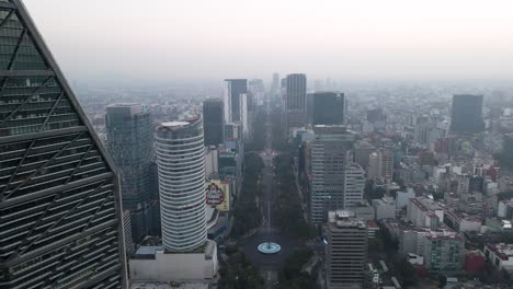 Aerial-view-of-the-iconic-Paseo-de-La-Reforma-avenue-with-BBVA-and-The-Ritz-Carlton-Towers-on-its-sides