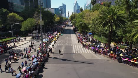Aerial-view-overlooking-the-empty-parade-street-on-Reforma-Avenue,-in-sunny-Mexico-city
