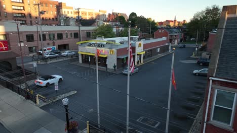 Aerial-establishing-shot-of-a-McDonald's-in-an-American-city