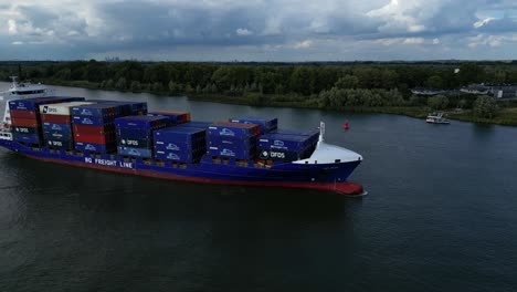 -BG-Onyx-Cargo-Container-Ship-Approaching-Along-Oude-Maas-Through-Zwijndrecht-On-Overcast-Day