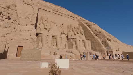 Historic-site-Abu-Simbel-in-Egypt,-tourist-attraction-Great-Temple-of-Ramesses-II,-colossal-statues