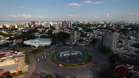 Aerial-view-around-the-Minerva-Roundabout,-Guadalajara,-Mexico---orbit,-drone-shot