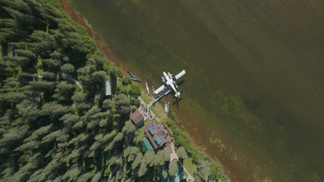 Beautiful-bird's-eye-view-of-a-seaplane-docked-on-a-river-bank