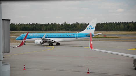 KLM-City-Hopper-airplane-drives-over-runway-at-nuremberg-airport