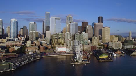 Aerial-view-around-the-Central-waterfront-of-Seattle,-Washington,-USA---circling,-drone-shot