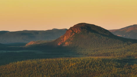 Gorgeous-aerial-wide-angle-of-the-Labrador-mountain-range-in-the-beautiful-golden-light-of-sunset