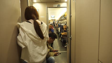 Kunming,-Yunnan,-China---September-1,-2022:-passenger-scene-inside-the-high-speed-train