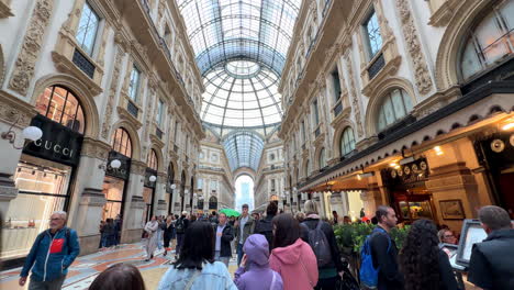 Walking-through-Galleria-Vittorio-Emanuele-II-shopping-mall-in-Milan