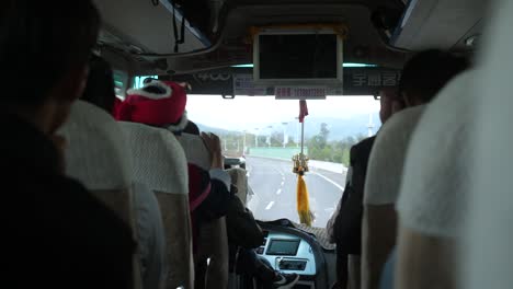 Kunming,-Yunnan,-China---September-1,-2022:-passenger-scene-inside-the-bus-at-daytime