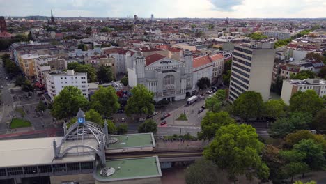 Grand-Theater-Metropol-at-schöneberg
Calm-aerial-view-flight-fly-backwards-drone
of-Nollendorf-Place-Berlin-Germany-at-summer-day-2022