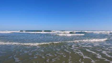 Rising-out-of-the-ocean-waves-on-beautiful-Hilton-Head-Island,-South-Carolina