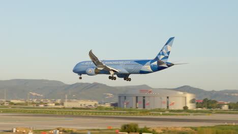Customized-etihad-manchester-city-airplane-landing-in-barcelona-el-prat-airport