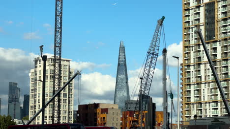 The-Shard-London-skyscraper-with-construction-and-cranes-in-foreground