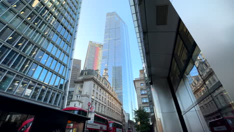 Camera-tilting-down-from-tall-skyscrapers-to-street-in-City-of-London
