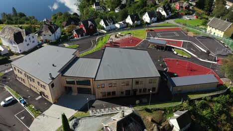 Vaksdal-elementary-school-in-Vaksdal-municipality-in-western-Norway---Aerial-view-of-band-new-schoolbuilding-and-playground