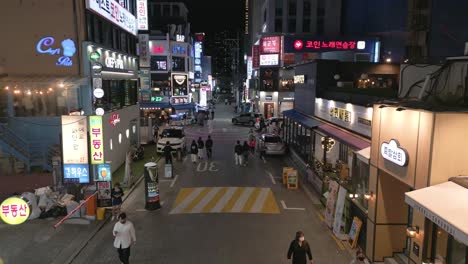 Drone-shot-of-a-street-view-in-Seoul-at-night,-South-Korea