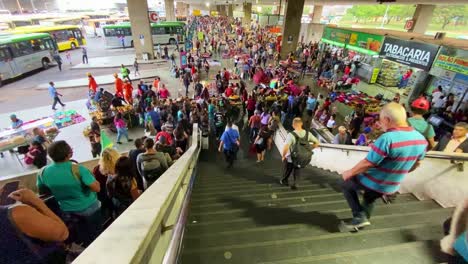 Crowd-of-commuters-during-rush-hour-at-a-bus-terminal-station-in-Brasilia,-Brazil
