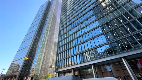 Wide-angle-establishing-shot-glass-skyscrapers-and-street-in-London