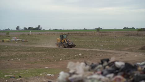 A-bulldozer-moving-onto-a-landfill-loaded-with-waste