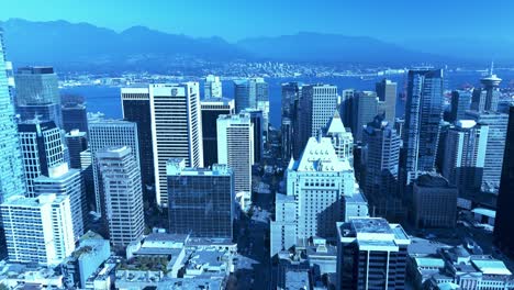 Vancouver-Bc-Kanada-Innenstadt-Geschäftsviertel-Neben-Hoher-Einkaufsdrohne-Nah-überführung-Hochhaus-Atemberaubende-Sonnige-Tageszeit-Sonne-Reflektierende-Schatten-Verschönern-Die-Neugeborene-Moderne-Stadt-4k-4-4yvr