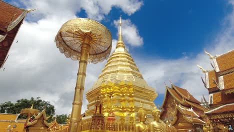 Slow-tilt-up-over-beautiful-golden-Pagoda-at-Doi-Suthep-temple-in-Chiang-Mai,-Thailand