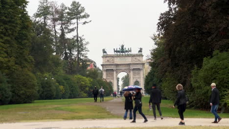 Milan-park-with-trees-and-nature-and-view-of-Porta-Sempione-arch-gate