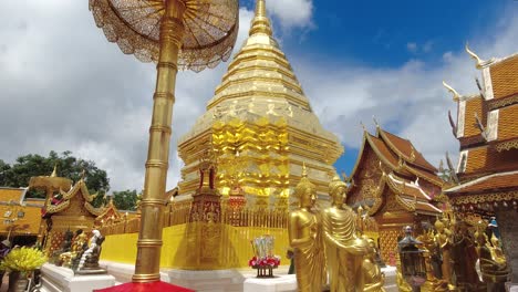 Slow-tilt-down-over-beautiful-golden-Pagoda-at-Doi-Suthep-temple-in-Chiang-Mai,-Thailand