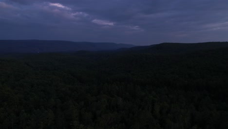 A-beautiful-aerial-night-time-lapse-of-the-ancient,-enchanted-Appalachian-mountains-during-summer