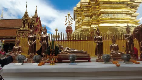 People-walking-around-temple-grounds-of-Doi-Suthep-in-Chiang-Mai,-Thailand