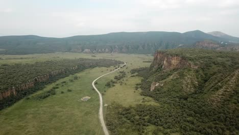 Beautiful-drone-view-of-the-landscape-near-Lake-Naivasha,-Hell's-Gate-National-Park,-Kenya,-Africa