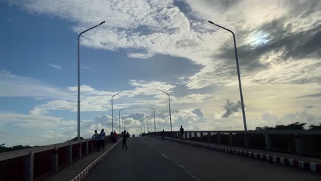 POV-Driving-Along-Bridge-Expressway-In-Sylhet-With-Blue-Sky-And-Clouds-In-The-Air