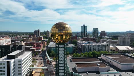 Aerial-view-of-the-Sunsphere-and-downtown-Knoxville,-USA---circling,-drone-shot