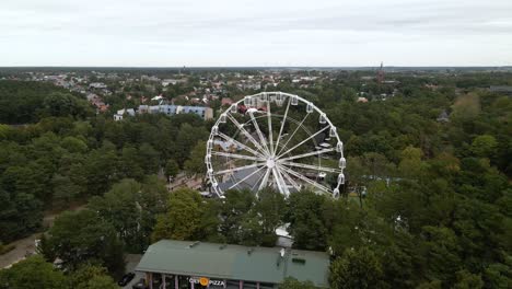 Aerial-shot-of-Ferris-wheel-on-a-summer-day-in-Palanga,-Lithuania