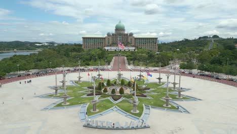 Aerial-pedestal-up-shot-of-Putra-Square-in-Putrajaya-with-Prime-Minister-Office