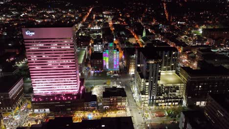 Aerial-view-around-the-illuminated-streets-of-downtown-Cincinnati,-USA,-during-BLINK-the-festival-of-lights