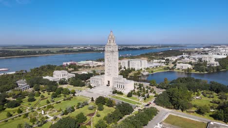 Capitol-Building-in-Downtown-Baton-Rouge,-Louisiana-Aerial-Tracking-Left-With-Mississippi-River-in-Background