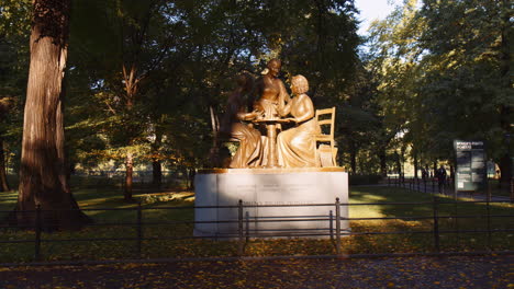 Women's-Rights-Pioneers-Monument-Statue-Sculpture-in-Central-Park-New-York-City-Manhattan,-Bronze-Figures-in-Sunny-Morning-in-Autumn-Fall-Season