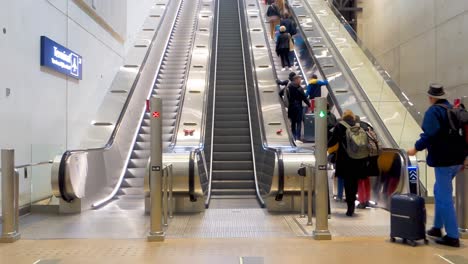 People-on-escalator-in-Helsinki-Vantaa-Airport-,-Finland