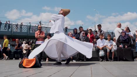 Istanbul,-Turkey,-Sufi-dance-performance-near-galata-tower-on-09-July-2022