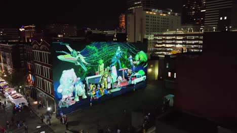 Aerial-view-of-a-LED-animation,-projected-on-a-wall-in-downtown-Cincinnati,-BLINK-festival-in-USA