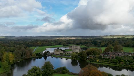Leeds-Castle-epic-drone-shot-with-big-clouds-and-stunning-scenery
