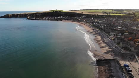 Rising-out-drone-shot-of-Stonehaven-in-Scotland,-UK
