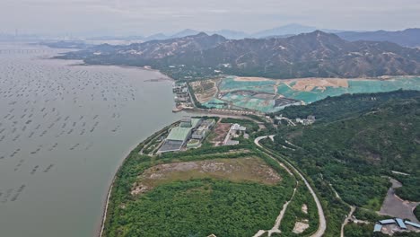 T-Park-and-West-New-Territories-Landfill-in-Tuen-Mun,-Tsang-Tsui,-Hong-Kong